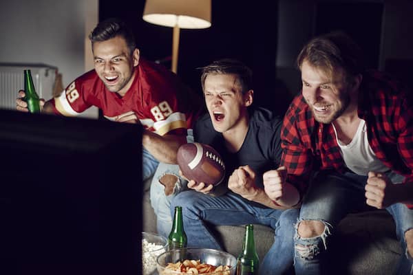 men enjoying football game